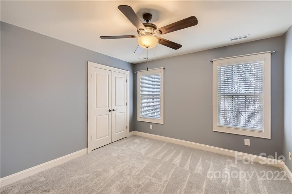 7653 Juniper Lane Denver, NC 28037 - Photo 16 of 28 a view of an empty room with a window