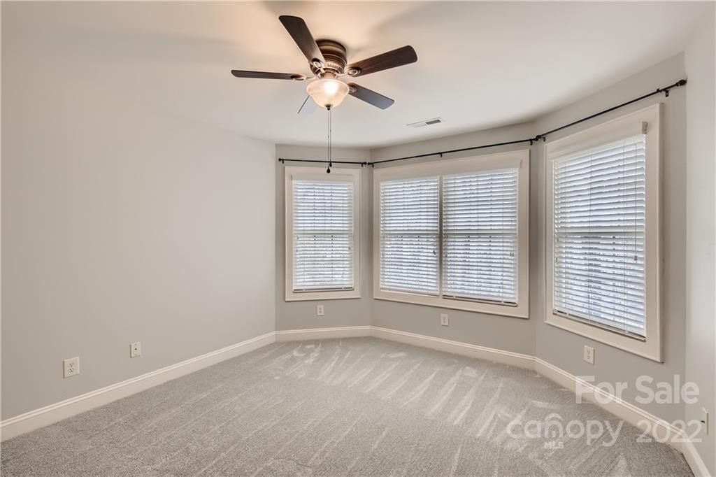 7653 Juniper Lane Denver, NC 28037 - Photo 17 of 28 a view of an empty room with a window