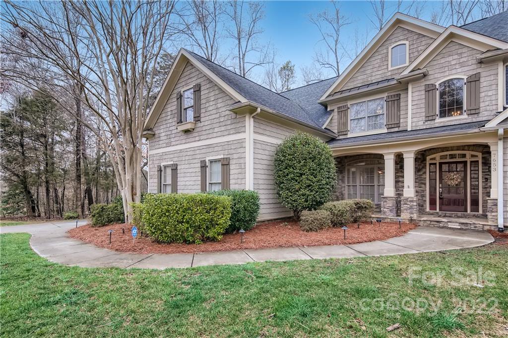 7653 Juniper Lane Denver, NC 28037 - Photo 2 of 28 a front view of a house with a yard