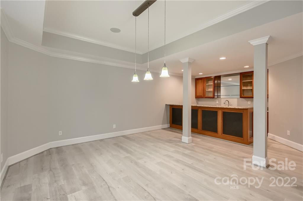 7653 Juniper Lane Denver, NC 28037 - Photo 24 of 28 a view of a kitchen with a sink and microwave