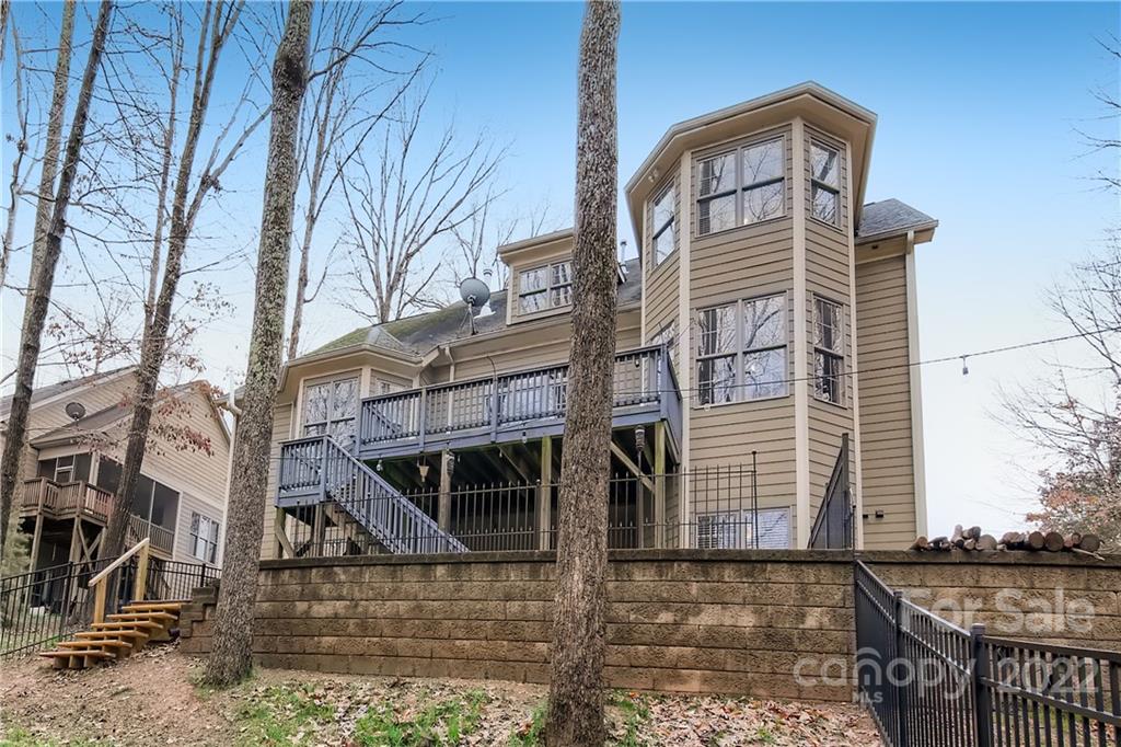 7653 Juniper Lane Denver, NC 28037 - Photo 28 of 28 a front view of a house with parking space