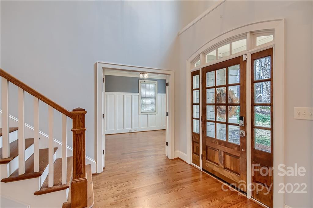 7653 Juniper Lane Denver, NC 28037 - Photo 3 of 28 a view of an entryway with wooden floor and door