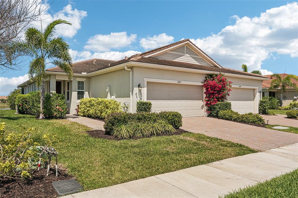 11622 Alessandro Lane Venice, FL 34293 - Photo 1 of 1 a front view of house with yard and green space