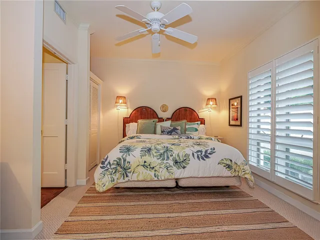 a view of a chairs and table in a backyard of the house