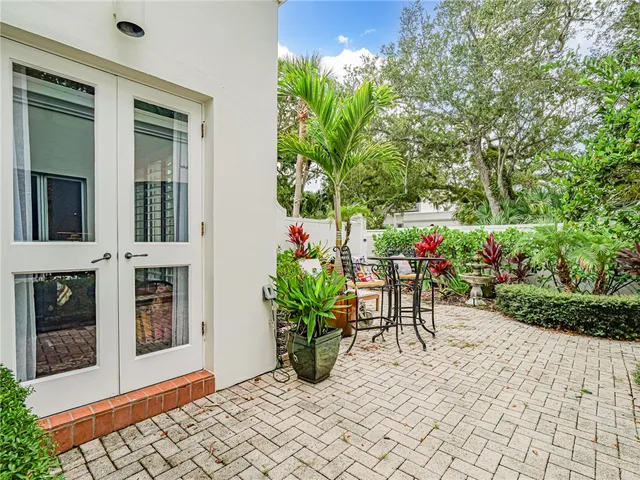 a view of a table and chairs in patio