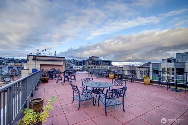 a view of a terrace with chairs