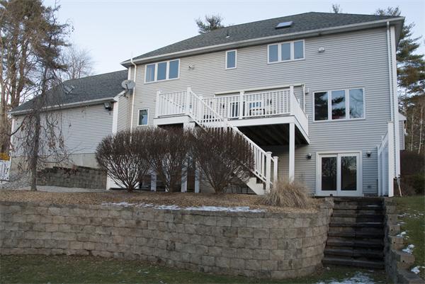 5 Warren Road Wilbraham, MA 01095 - Photo 27 of 29 a view of a white house with large windows