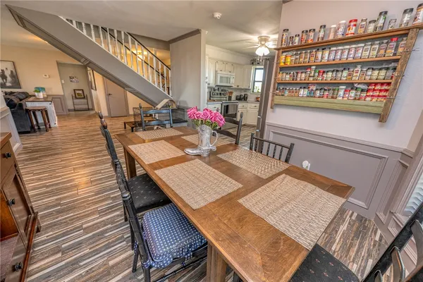 a view of a roof deck with furniture