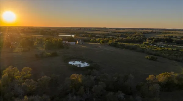 an aerial view of residential house with outdoor space