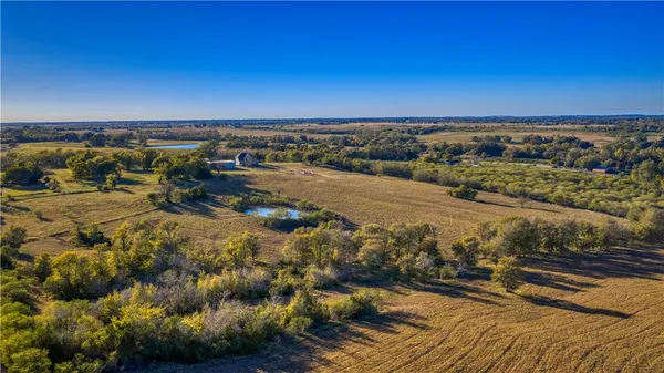 a view of an ocean beach and mountain