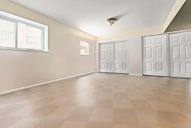 an empty room with windows