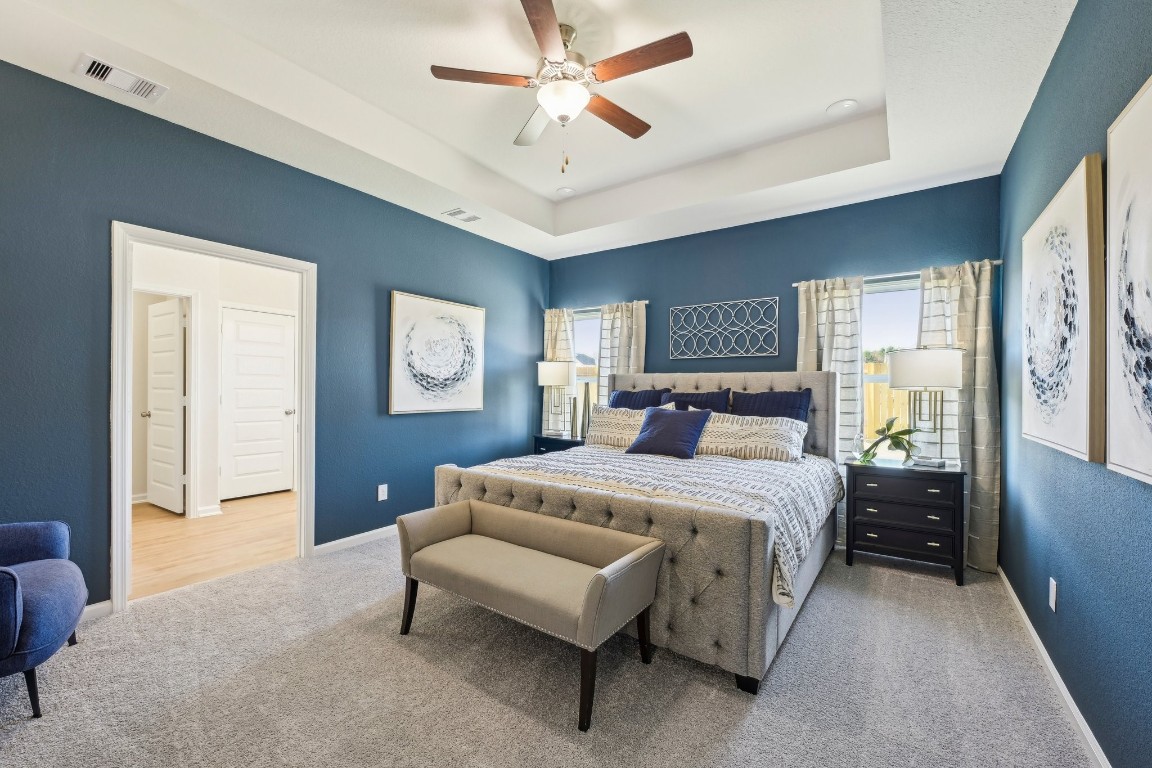 9706 Enclave Ridge Road Willis, TX 77318 - Photo 12 of 19 Oakshire II- Primary Bedroom. Sample image for illustration; upgrades, options, and colors may vary.