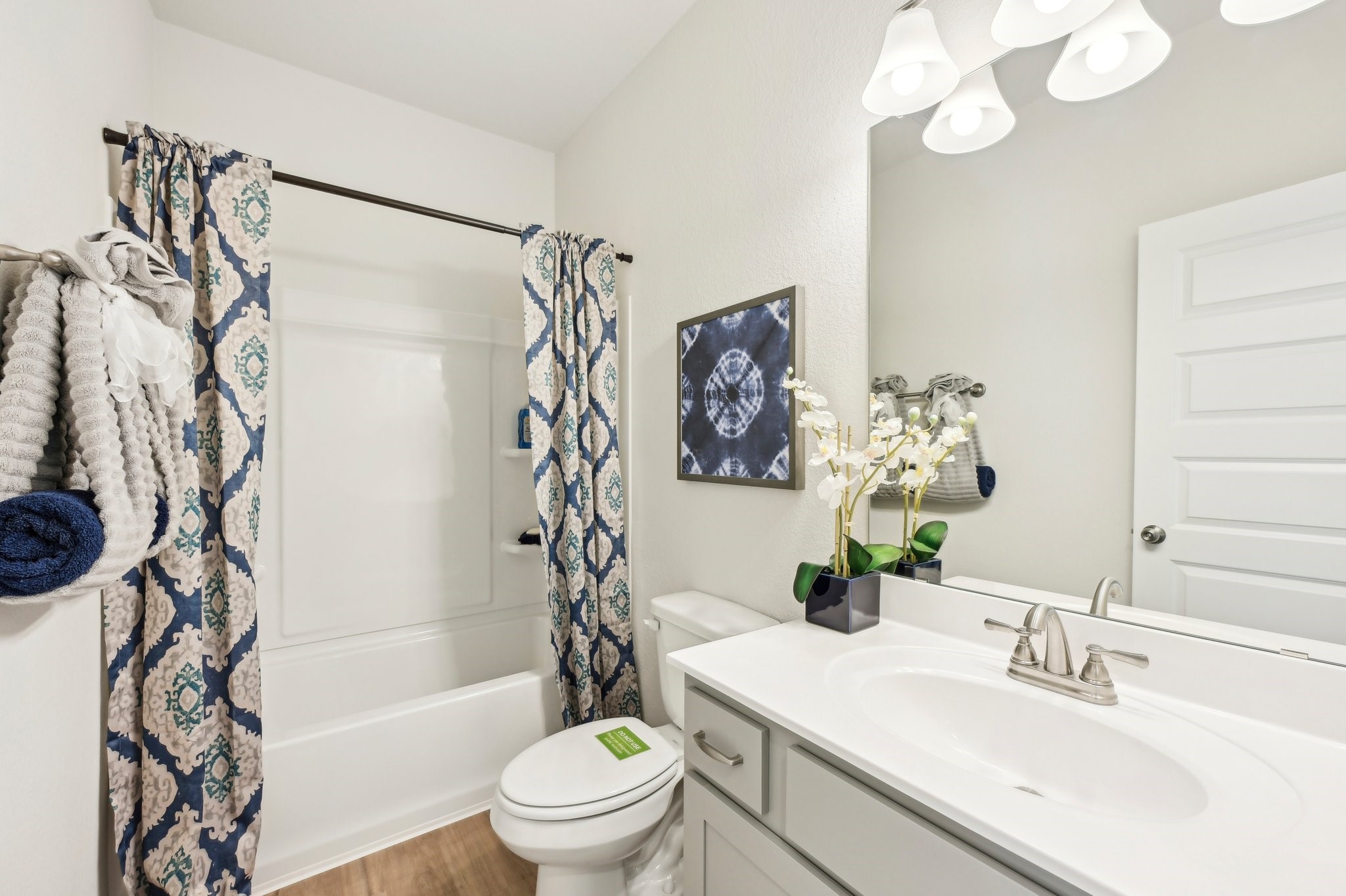 9706 Enclave Ridge Road Willis, TX 77318 - Photo 18 of 19 a bathroom with a sink toilet and shower