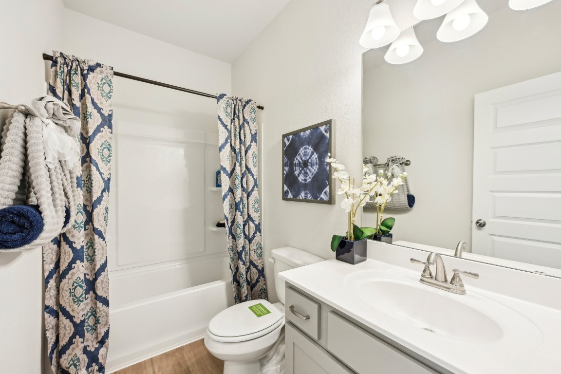 9706 Enclave Ridge Road Willis, TX 77318 - Photo 18 of 19 Oakshire II- Hall Bath. Sample image for illustration; upgrades, options, and colors may vary.