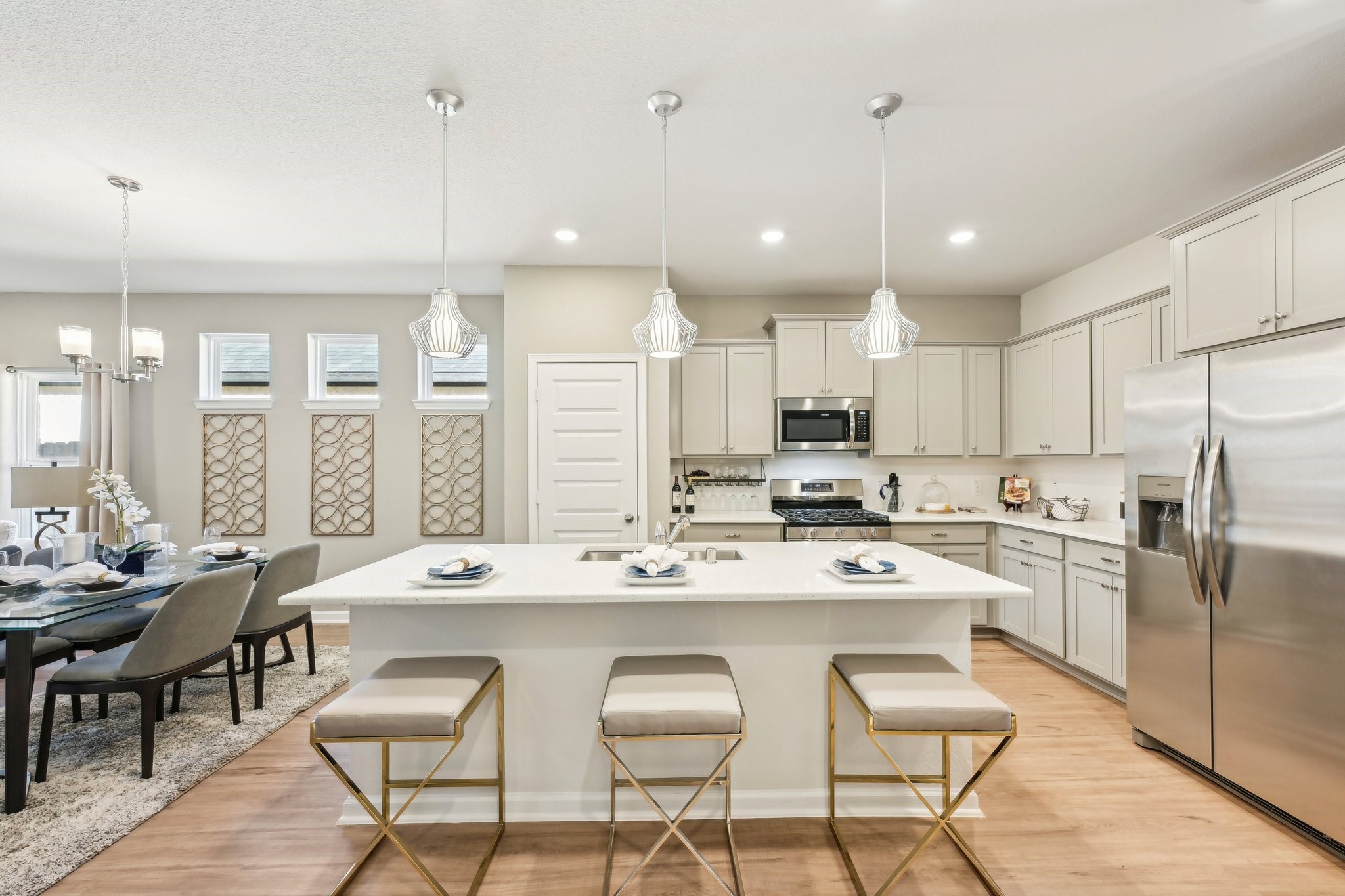 9706 Enclave Ridge Road Willis, TX 77318 - Photo 8 of 19 a large kitchen with a table and chairs