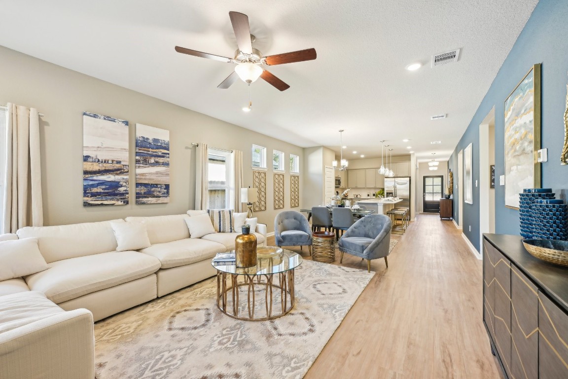 9706 Enclave Ridge Road Willis, TX 77318 - Photo 10 of 19 Oakshire II- Family Room. Sample image for illustration; upgrades, options, and colors may vary.