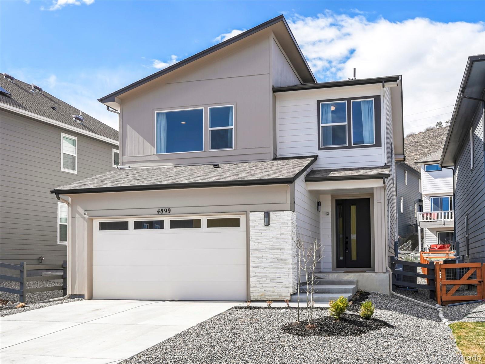 a front view of a house with patio