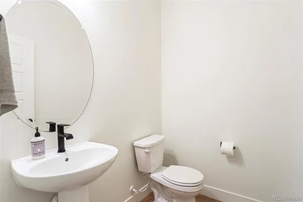 a bathroom with a sink and a toilet