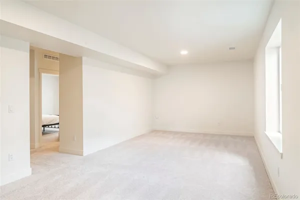 an empty room with a natural light