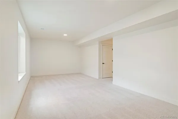 an empty room with a natural light