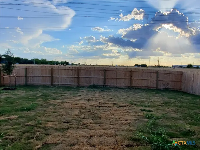 a view of a yard with a big yard