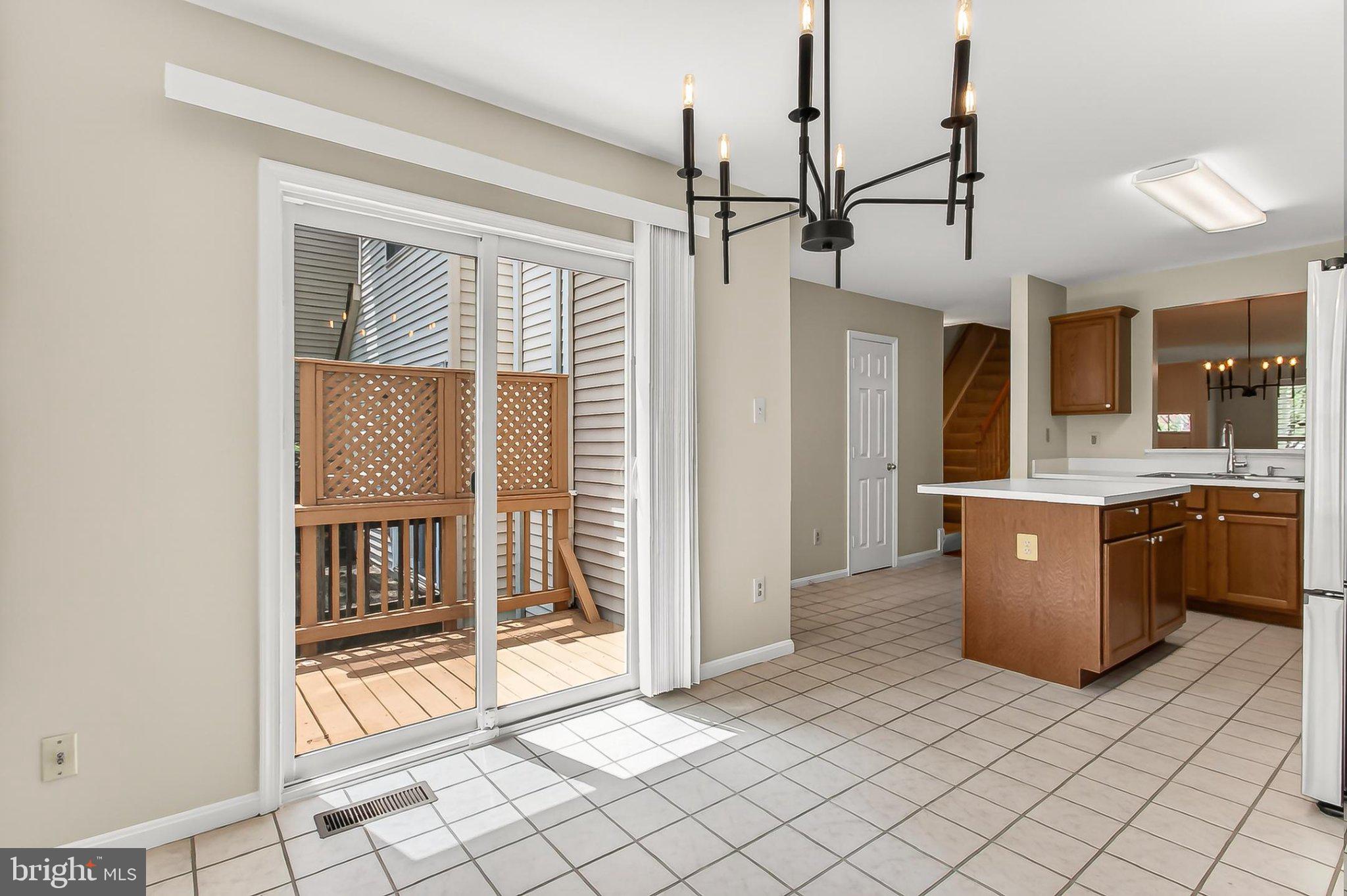 13157 Kidwell Field Road Herndon, VA 20171 - Photo 22 of 50 Bright and airy kitchen with deck access.