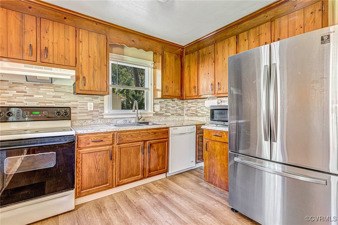 8929 Old Elam Cemetary Road Charles City, VA 23030 - Photo 5 of 20 Kitchen featuring tasteful backsplash, light hardw