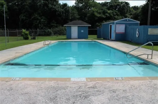a view of a tiny house with a yard