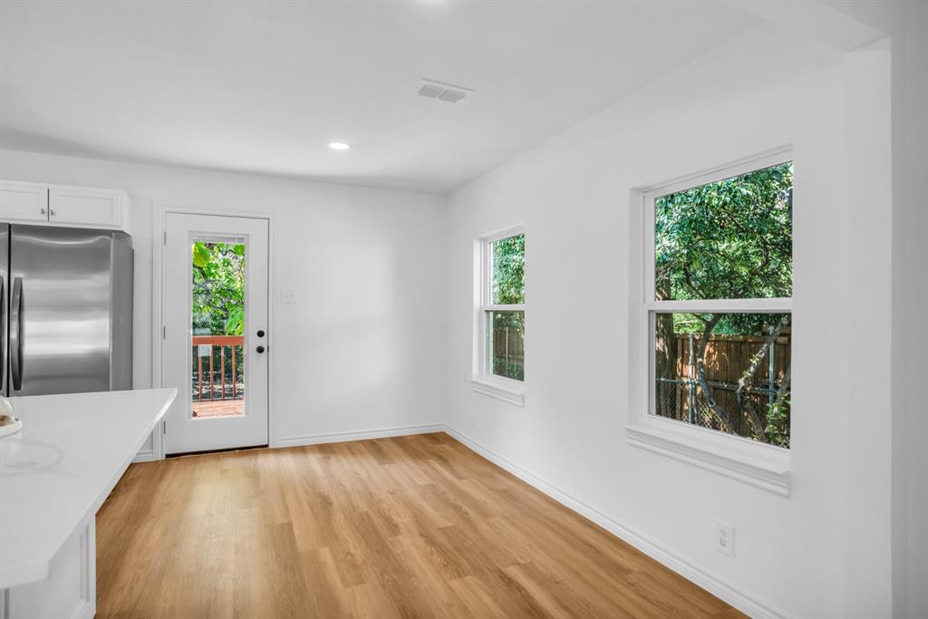 2108 Blake Avenue Dallas, TX 75228 - Photo 13 of 24 Unfurnished dining area with light wood-style flooring and recessed lighting