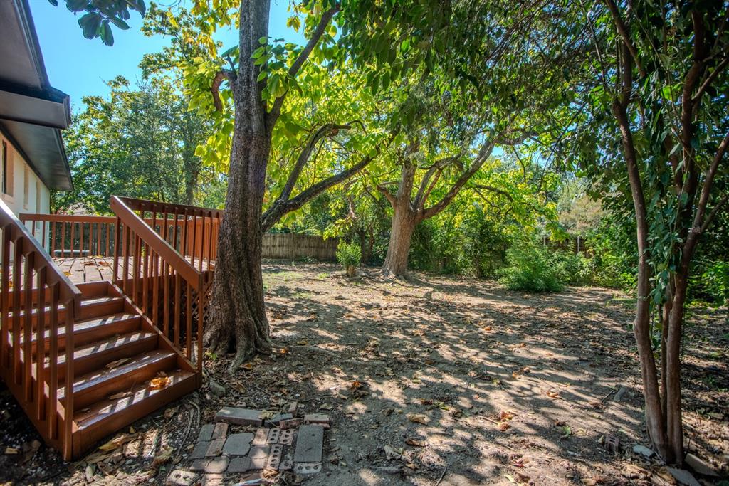 2108 Blake Avenue Dallas, TX 75228 - Photo 20 of 24 View of yard featuring stairway and a deck