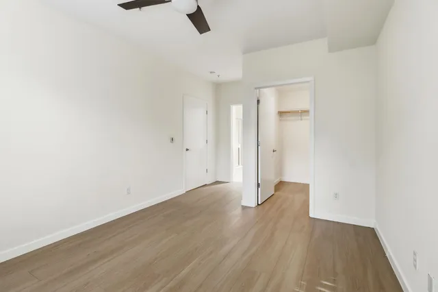a bathroom with a sink toilet tub and shower