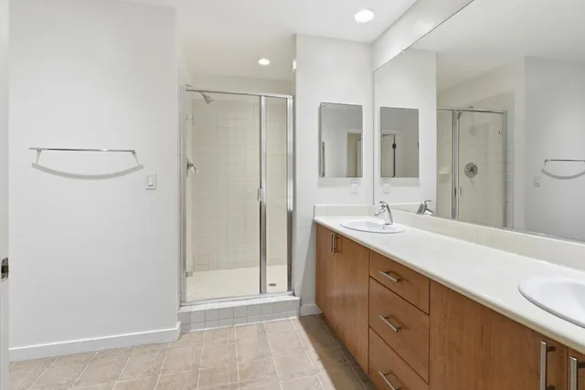 a view of a hallway with washer and dryer