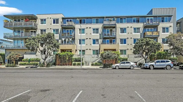a view of a swimming pool with a table and chairs