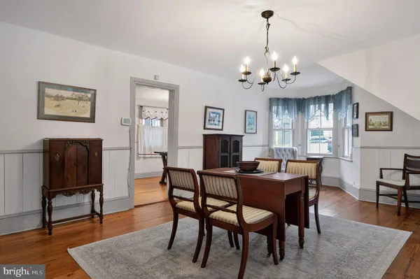a kitchen with stainless steel appliances granite countertop a stove and a refrigerator