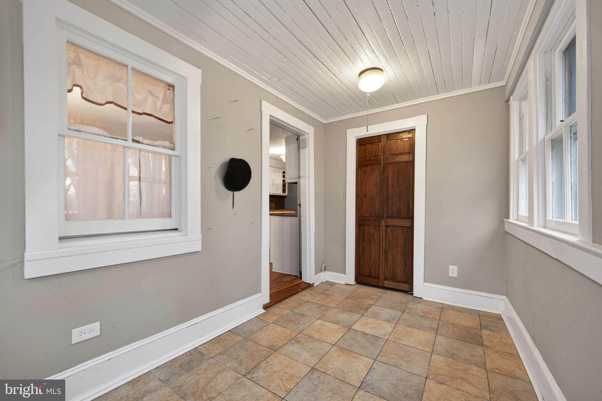 8100 Croom Road Upper Marlboro, MD 20772 - Photo 29 of 65 The mudroom leads to the main floor laundry room