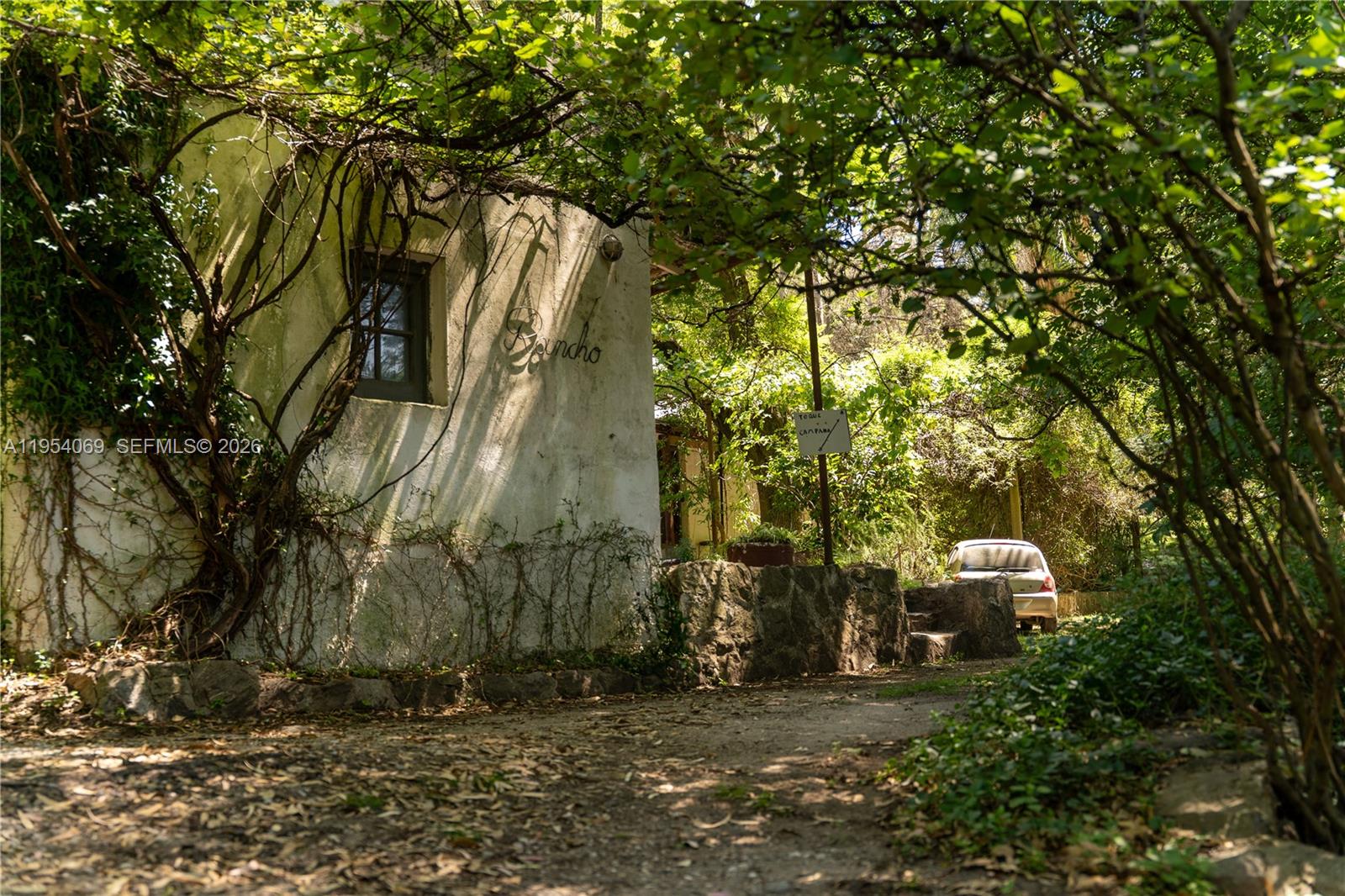 1 Segundo Paredon undefined, undefined 5186 - Photo 32 of 57 a car parked in front of a house