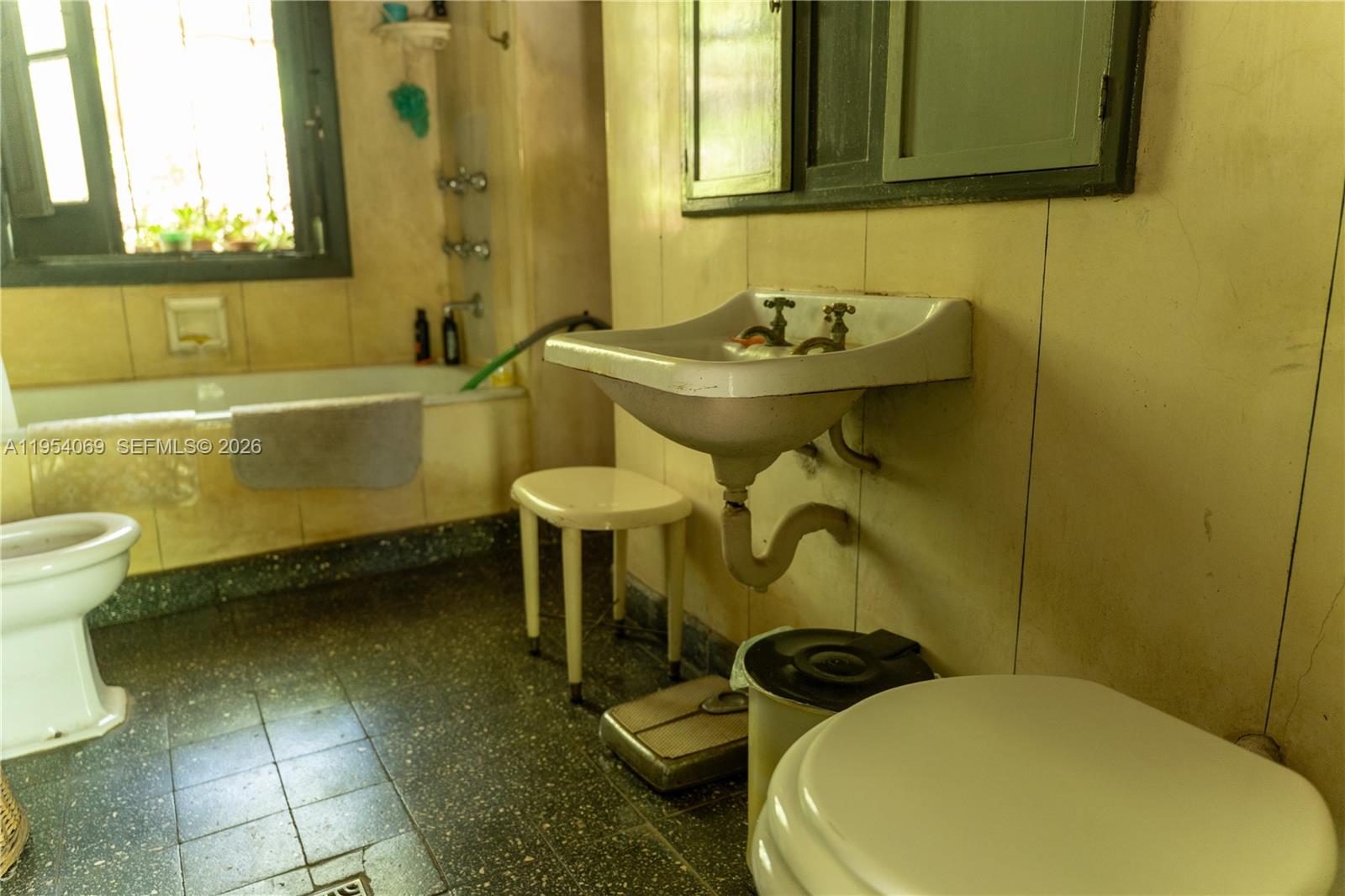 1 Segundo Paredon undefined, undefined 5186 - Photo 41 of 57 a bathroom with a sink and a mirror