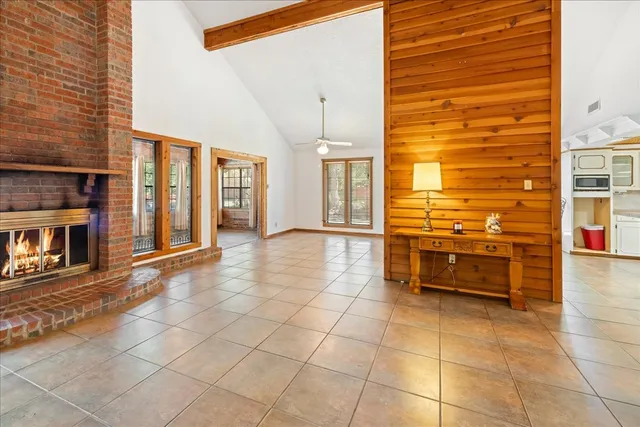 a view of an entryway with a fireplace