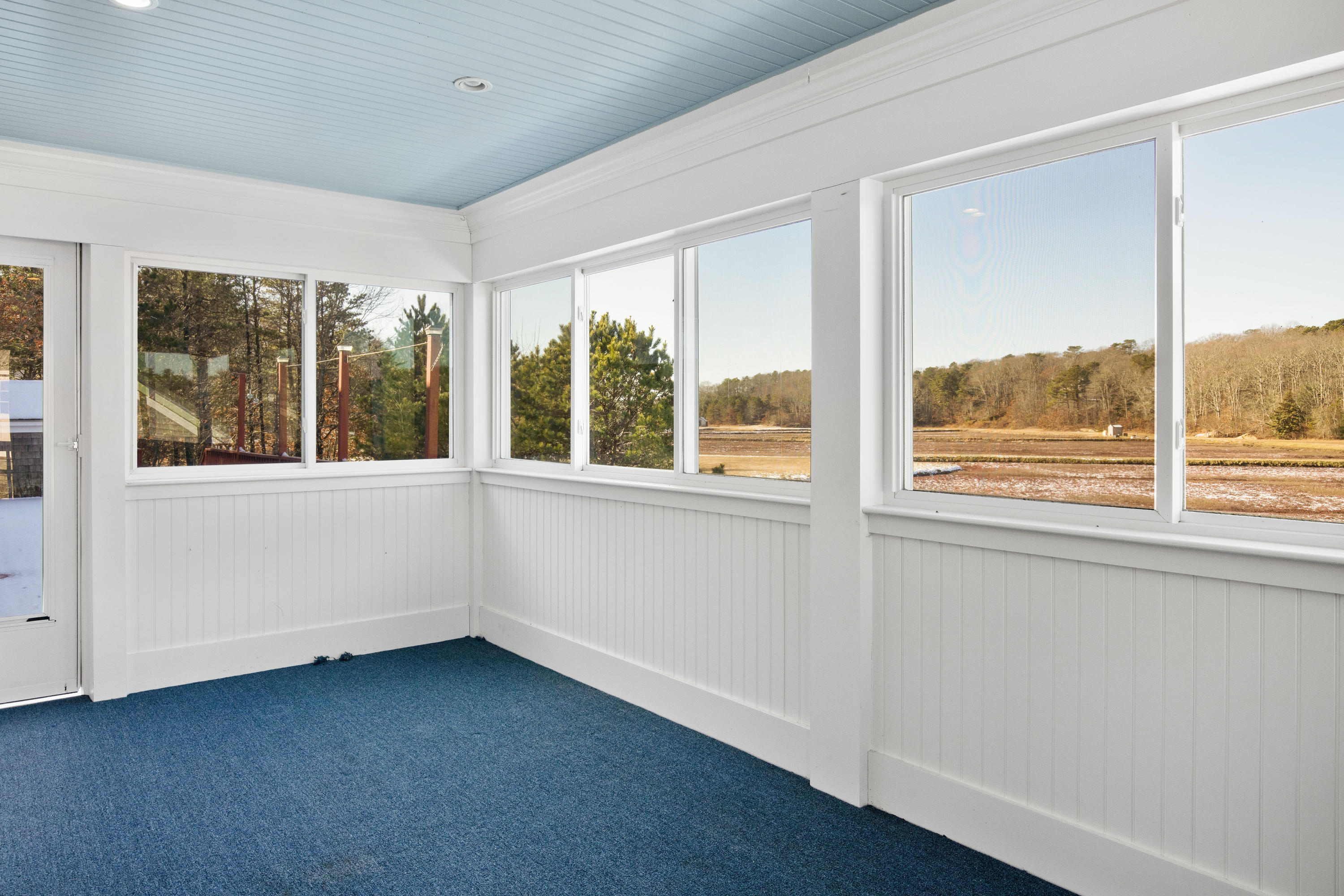 141 Bog Road Marstons Mills, MA 02648 - Photo 15 of 59 a view of an empty room with a window
