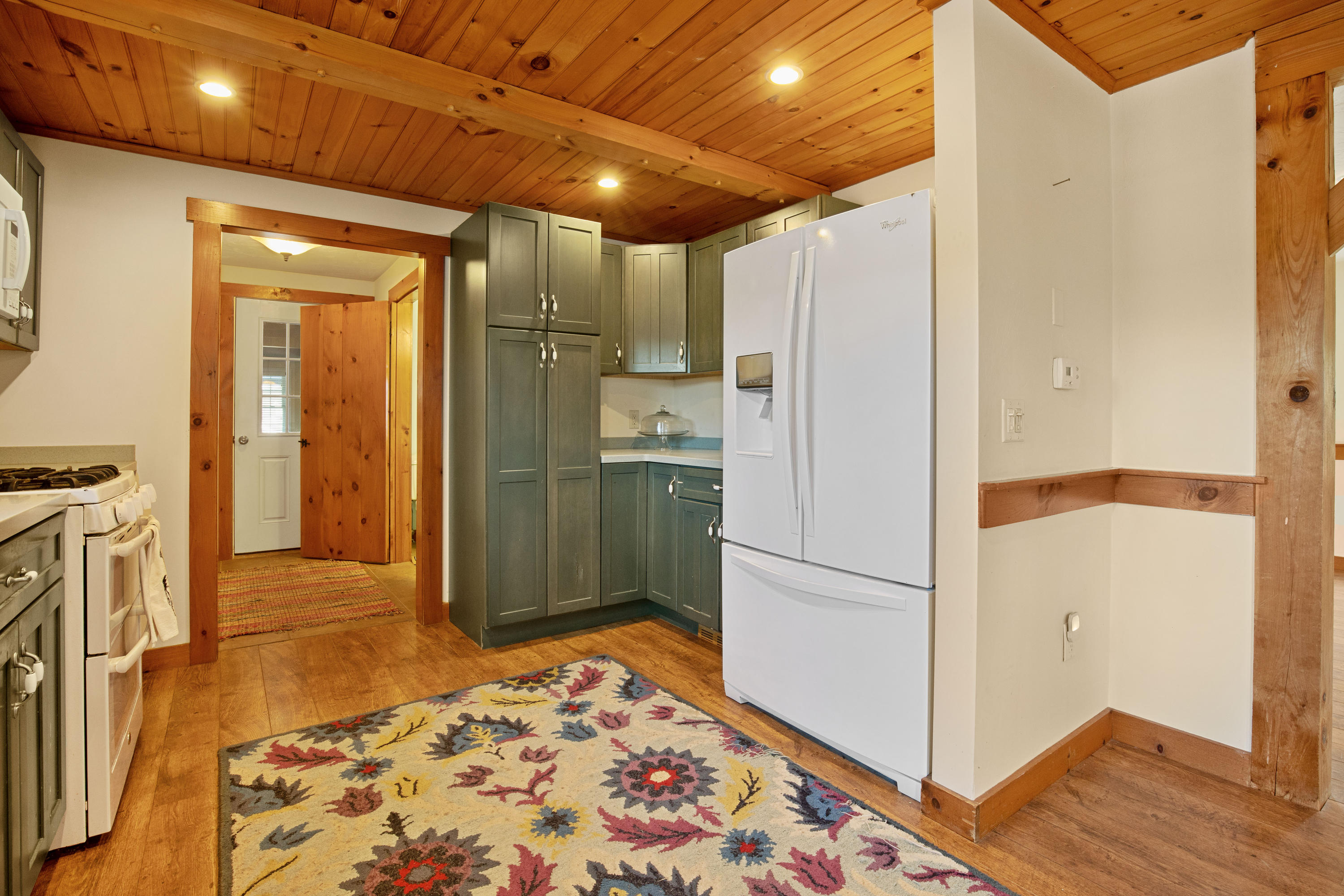 141 Bog Road Marstons Mills, MA 02648 - Photo 20 of 59 a refrigerator freezer sitting inside of a kitchen