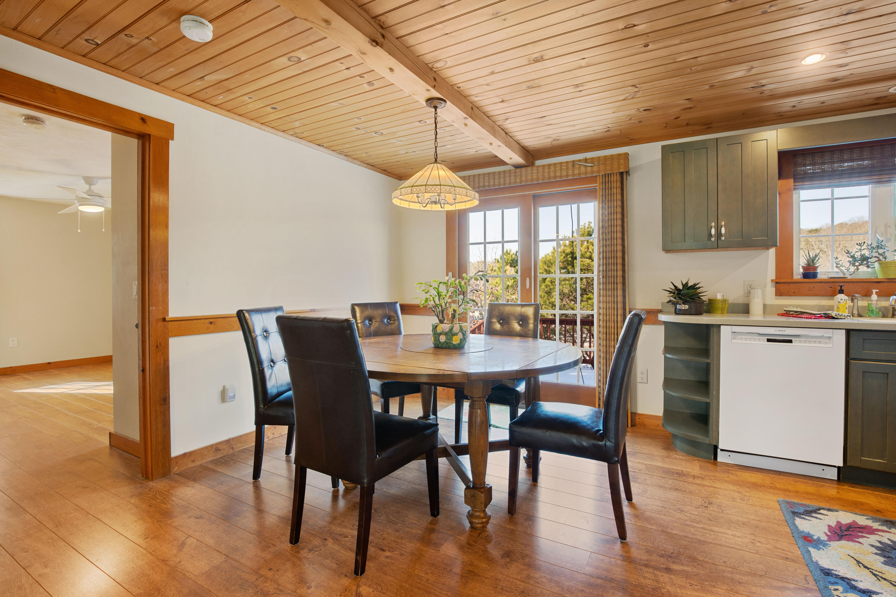 141 Bog Road Marstons Mills, MA 02648 - Photo 21 of 59 a view of a dining room with furniture window and wooden floor