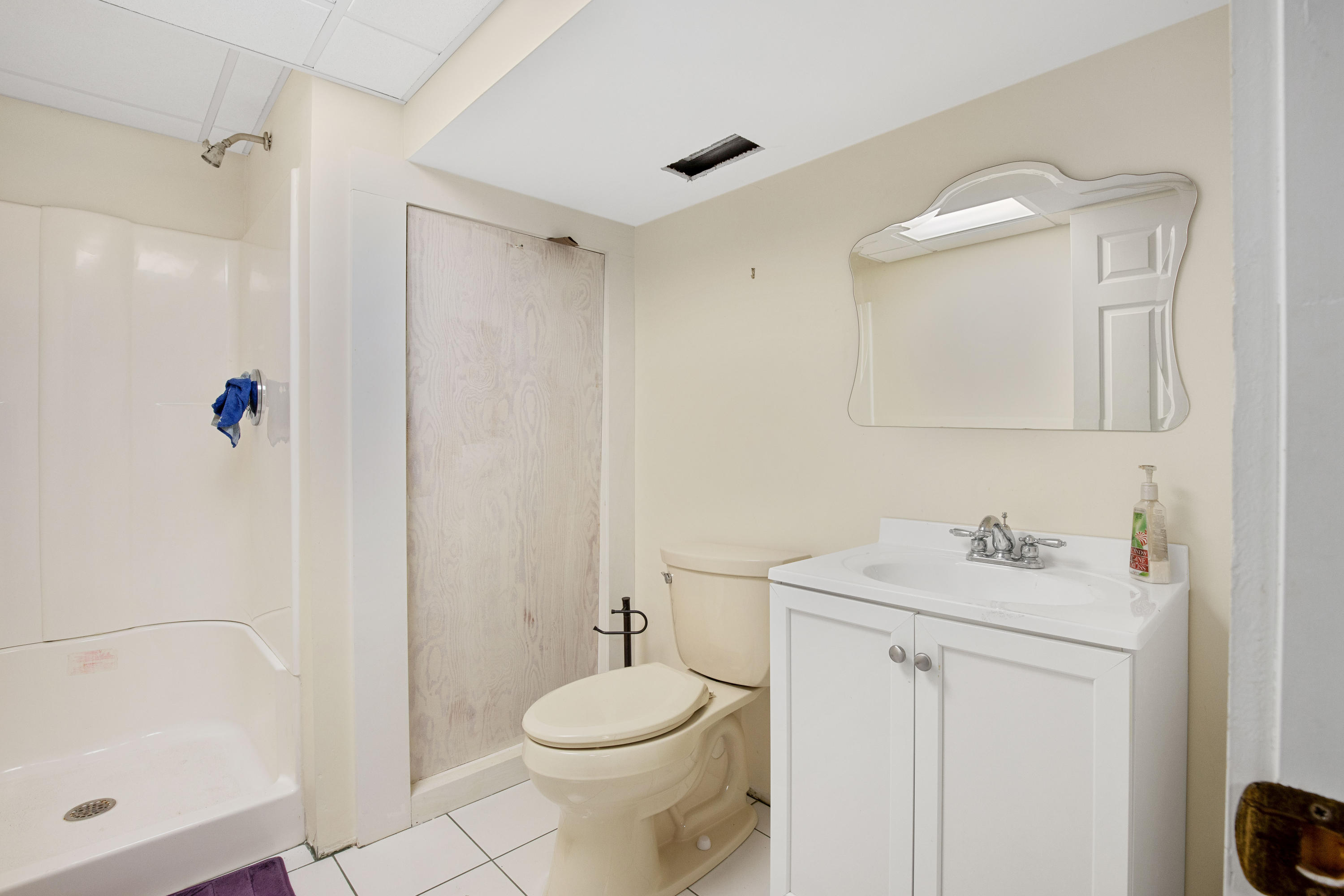 141 Bog Road Marstons Mills, MA 02648 - Photo 40 of 59 a bathroom with a sink a toilet and shower