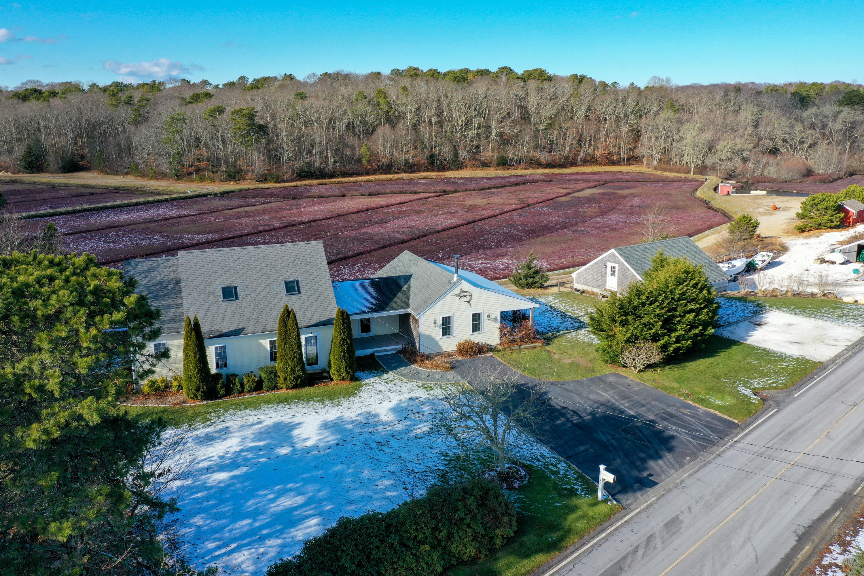 141 Bog Road Marstons Mills, MA 02648 - Photo 44 of 59 a view of a house with a yard