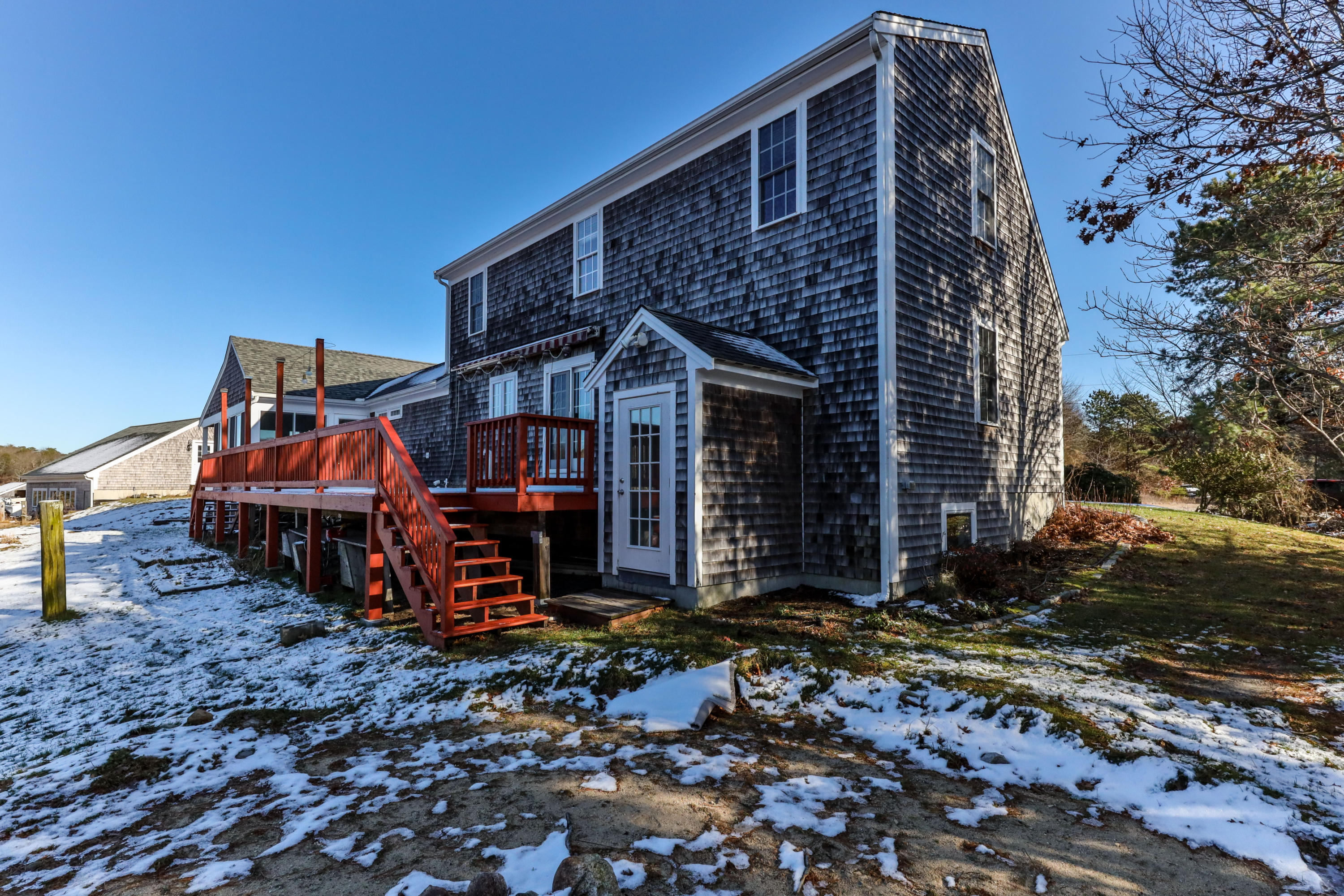 141 Bog Road Marstons Mills, MA 02648 - Photo 49 of 59 a front view of a house with garden