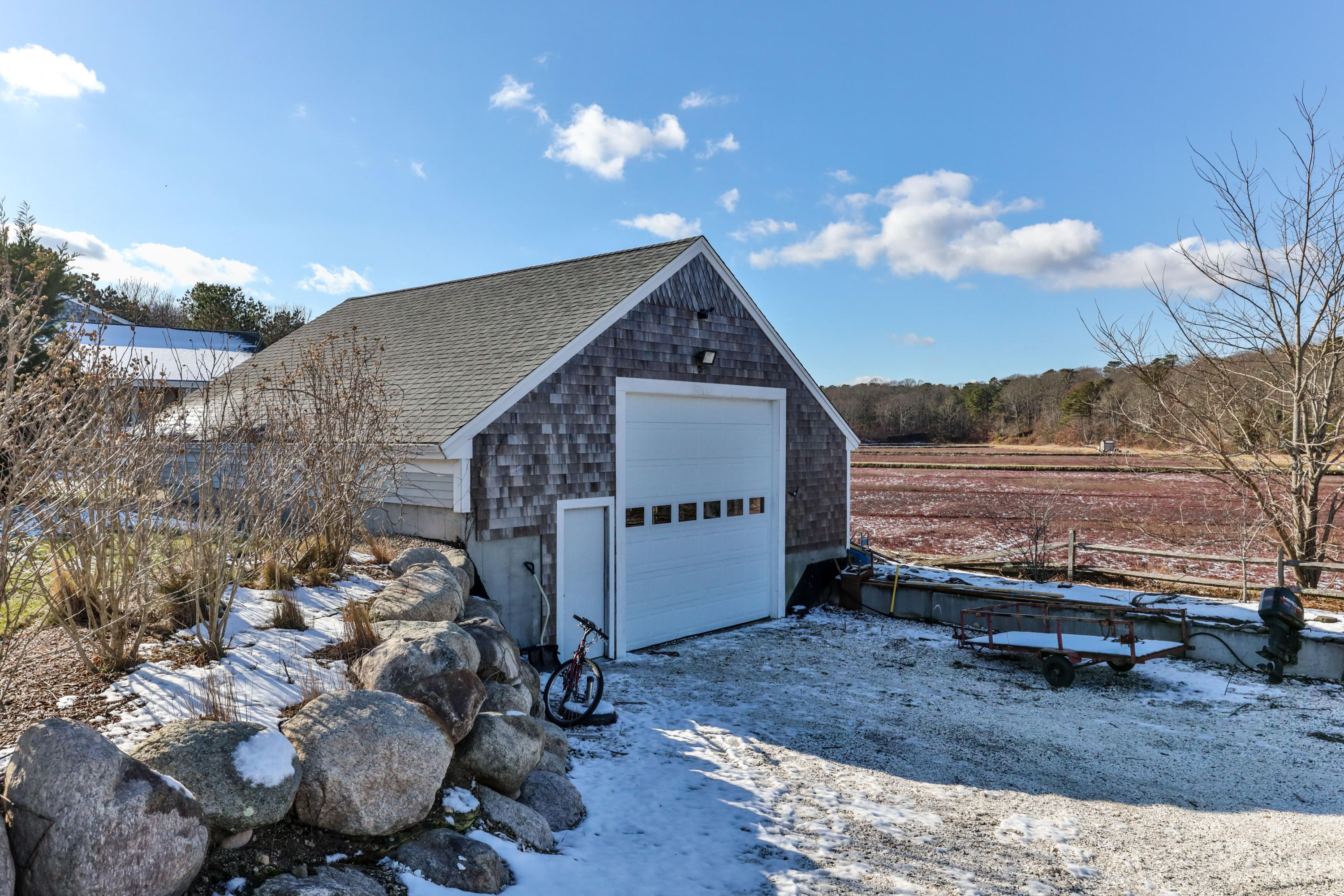 141 Bog Road Marstons Mills, MA 02648 - Photo 5 of 59 a view of a house with a yard