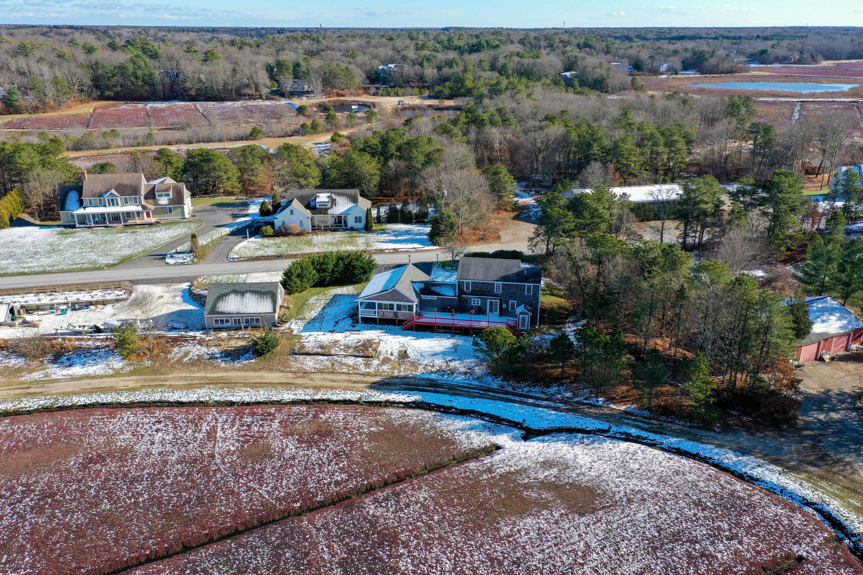 141 Bog Road Marstons Mills, MA 02648 - Photo 51 of 59 an aerial view of a house with a yard basket ball court and outdoor seating