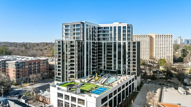 a view of a balcony with chairs