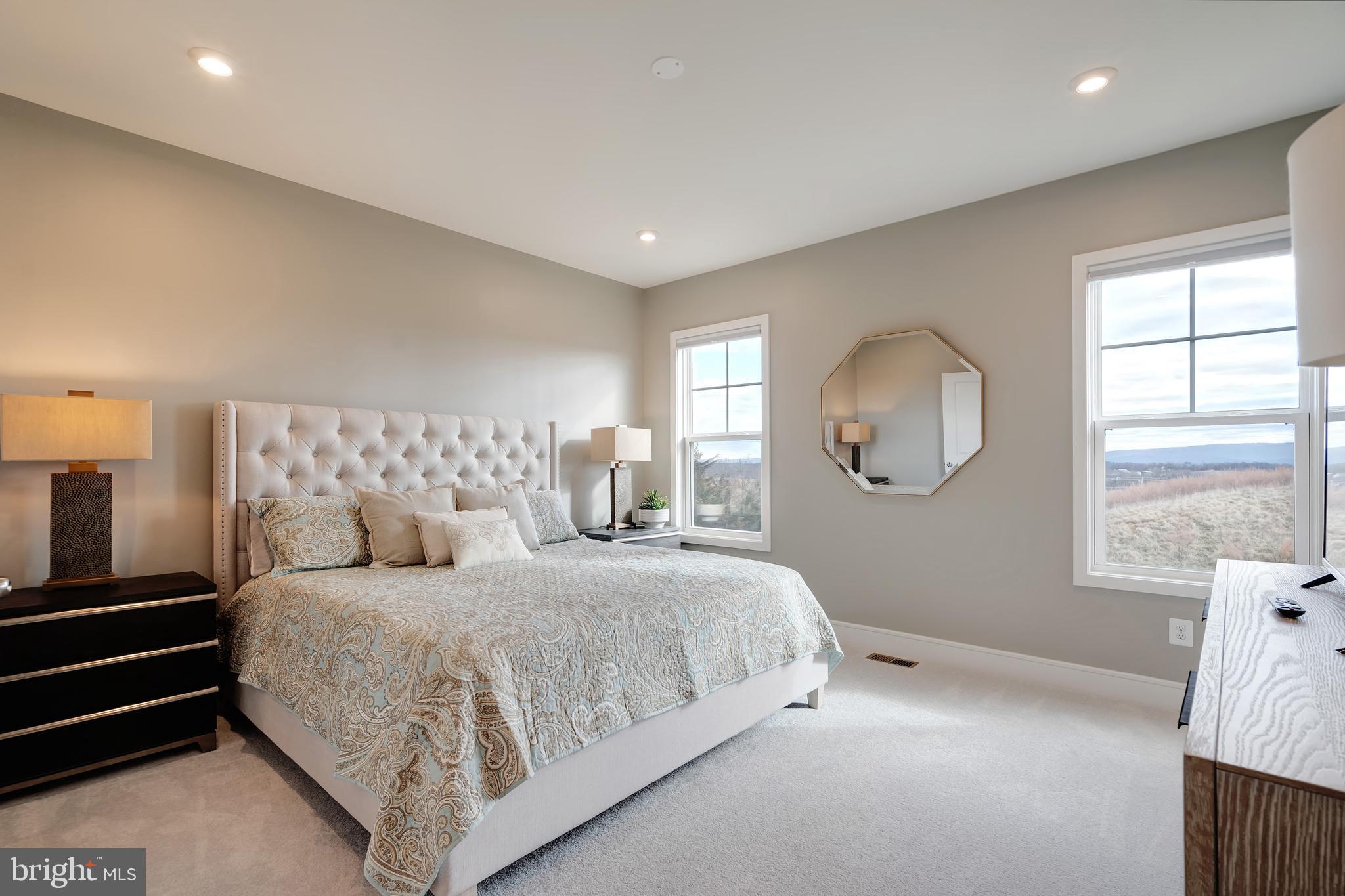 105 Checkerspot Way Front Royal, VA 22630 - Photo 23 of 39 a bedroom with a large bed and a window