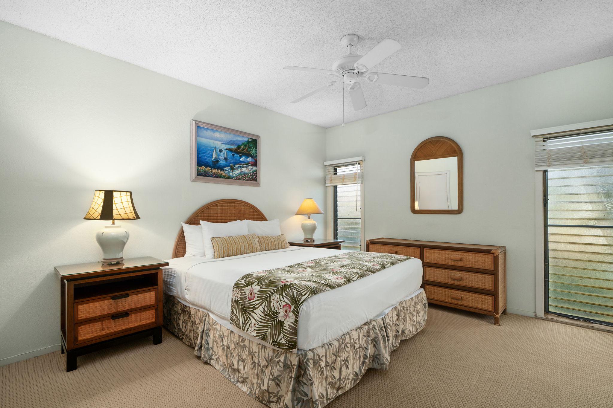 1565 Pe'e Road, Unit 418 Koloa, HI 96756 - Photo 12 of 30 a bedroom with bed and a window