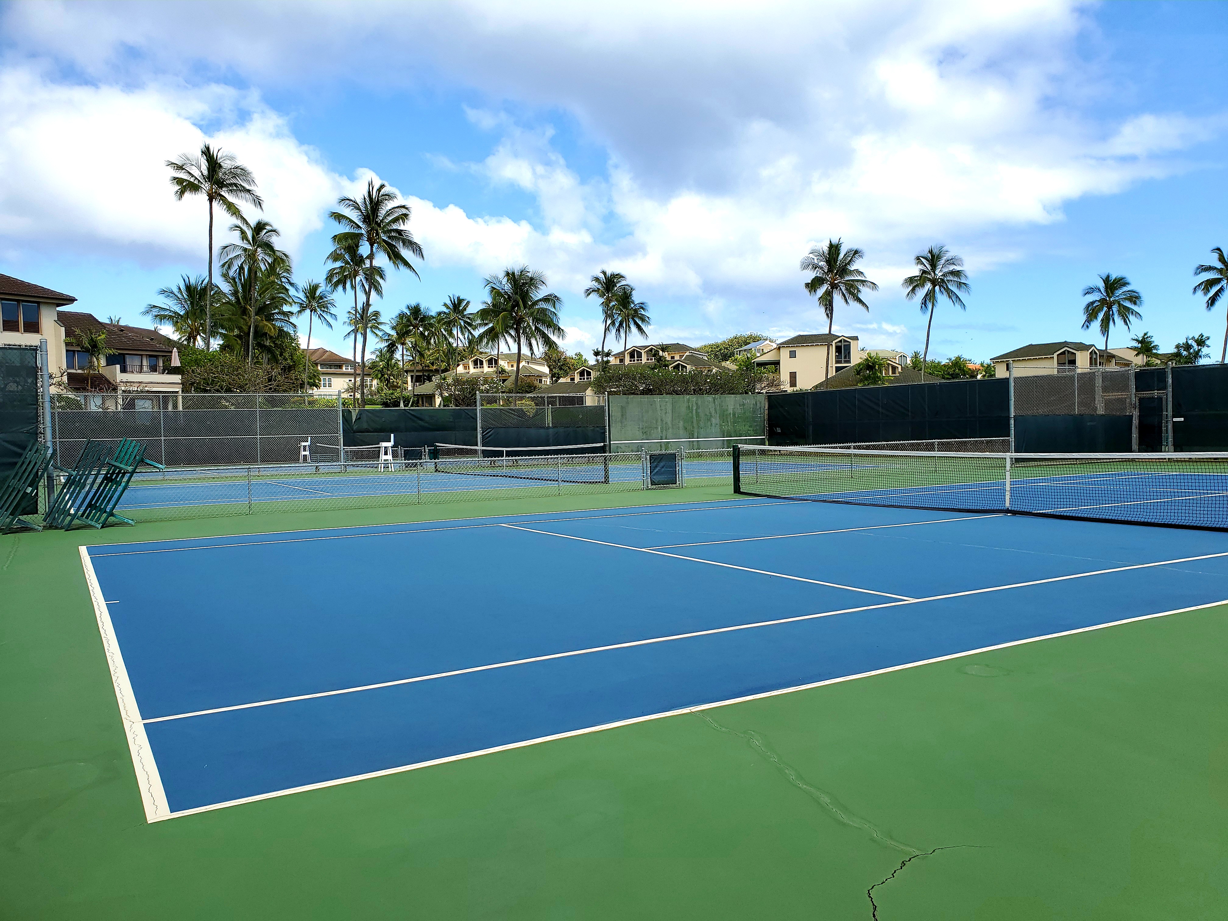 1565 Pe'e Road, Unit 418 Koloa, HI 96756 - Photo 27 of 30 a view of outdoor space and tennis court